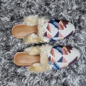 Faux fur lined, slide on women's mules